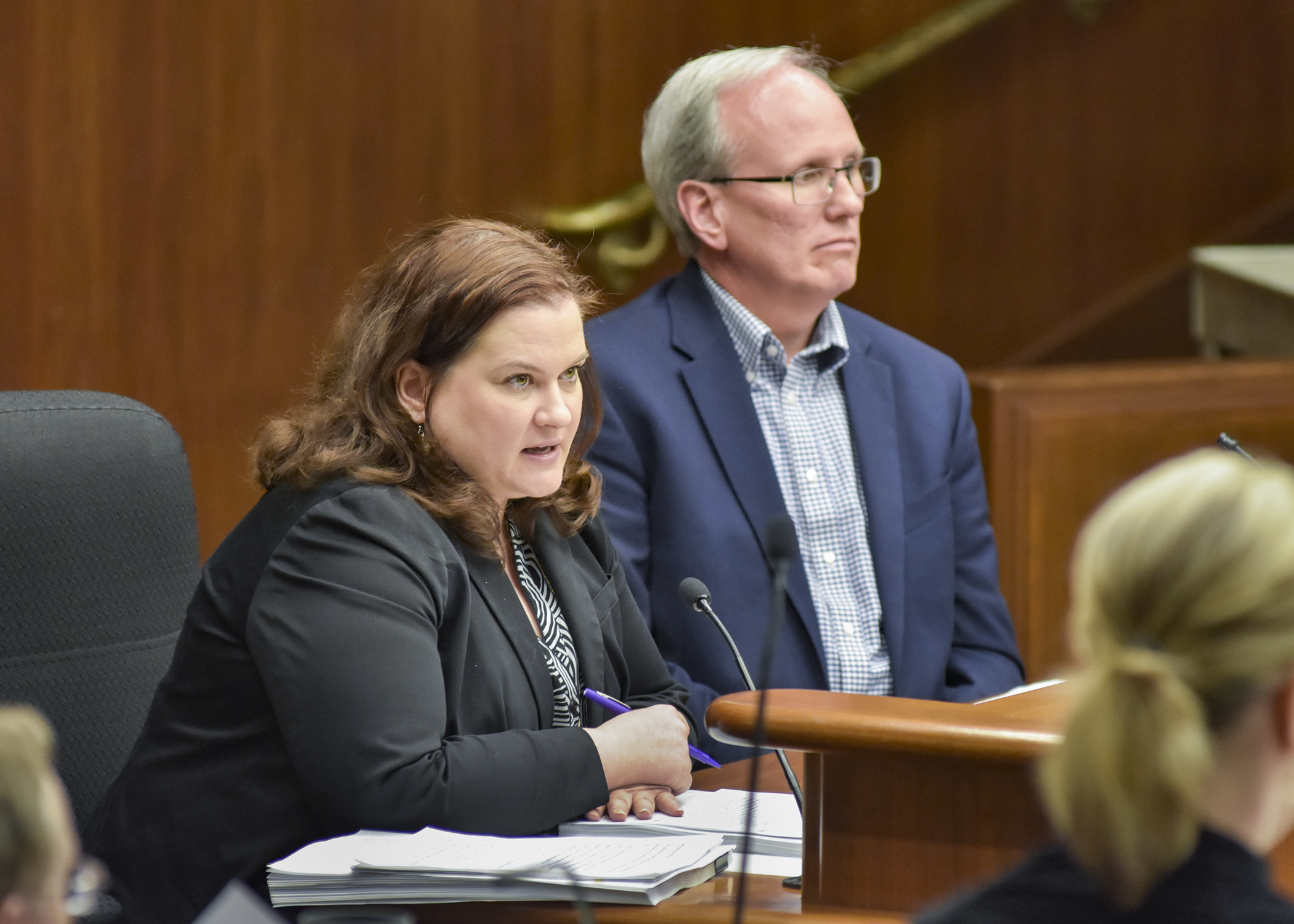 Erin Leonard, executive director of the Minnesota State Retirement System, testifies before the House Government Operations and Elections Policy Committee May 7 in support of the pensions bill, sponsored by Rep Tim O’Driscoll, right. Photo by Andrew VonBank
